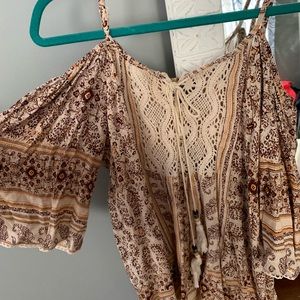 Light and dark brown blouse.